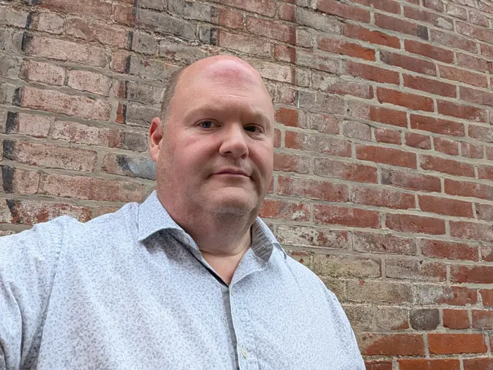 WitheringWithout: brick wall, white shirt